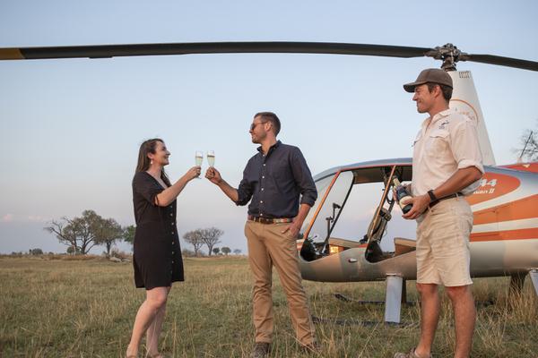 Couple celebrating Helicopter Sundowner