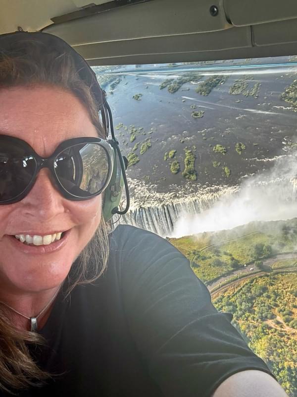 Sam in helicopter over Victoria Falls