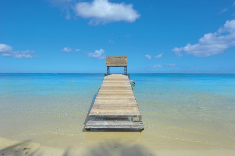 Trou Aux Biches Jetty in sea