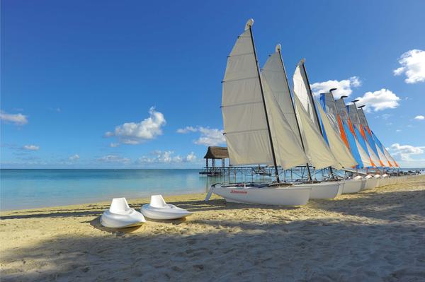 Trou Aux Biches beach kayaks sail boats