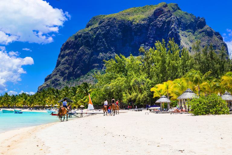 Horseriding on beach at Le Morne Mauritius