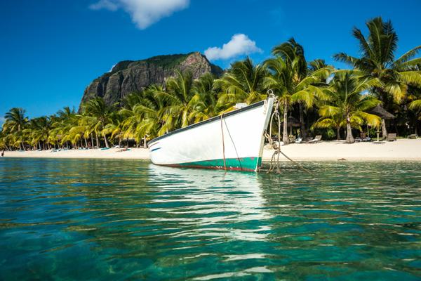 Mauritius Beach Boat in front of Le Morne