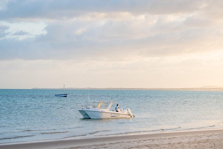 Azura Benguerra boats by beach