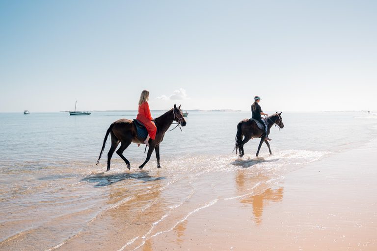 Azura Benguerra horse riding on beach