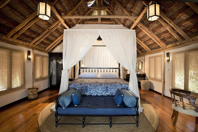 And Beyond Benguerra Island Cabana bedroom