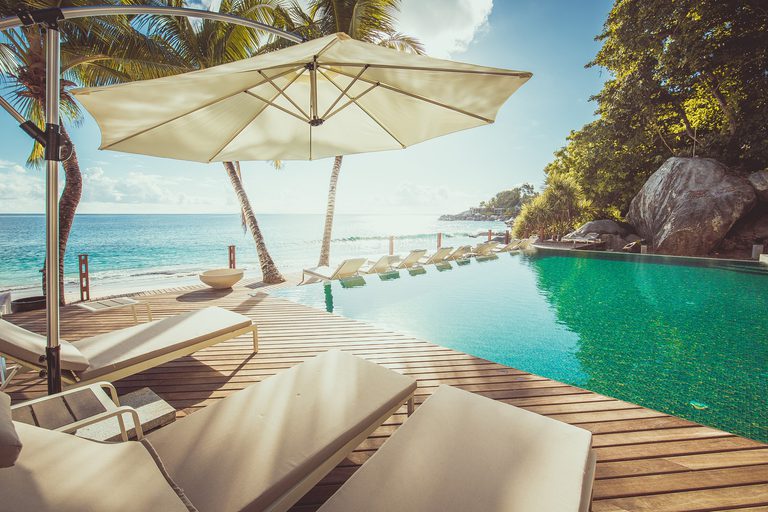 Carana Beach Sunbeds by the pool