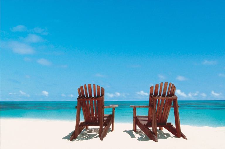 Classic Denis Island Chairs overlooking ocean