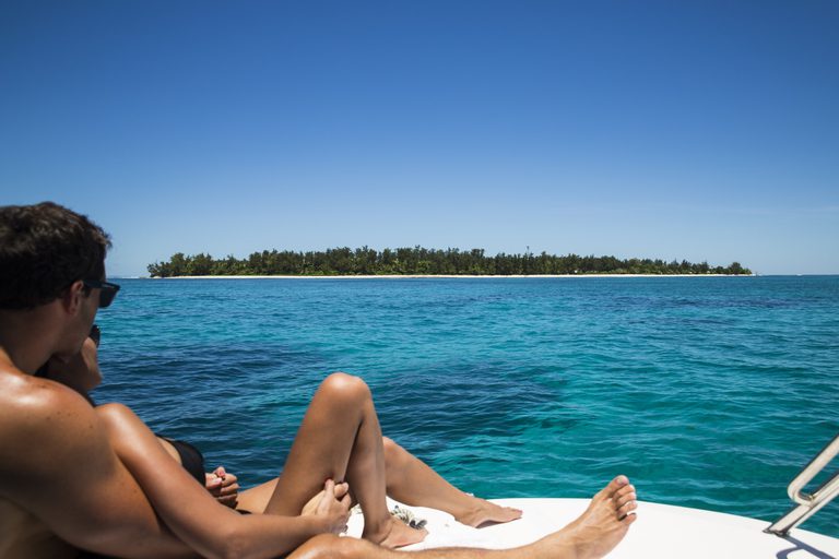 Couple on boat looking at Denis Private Island