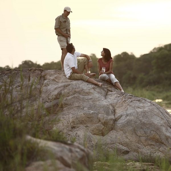 And Beyond Kirkmans romantic couple and ranger on rock SQUARE
