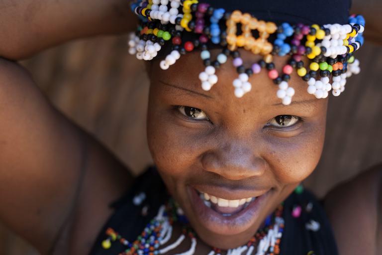 Smiling colourful dancer Phezulu Safari Park Valley of a Thousand Hills KZN SAT