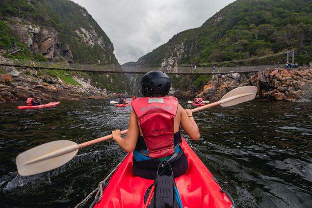 Kayakers paddling up Storms River SAT