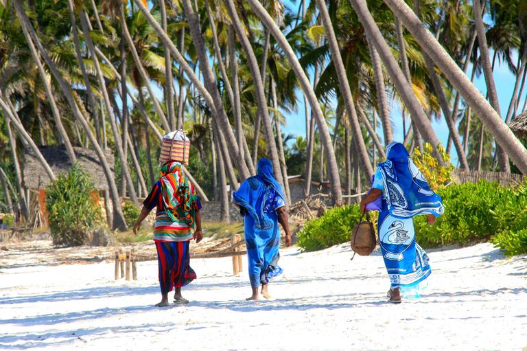 Colourful women on Zanzibar beach SS