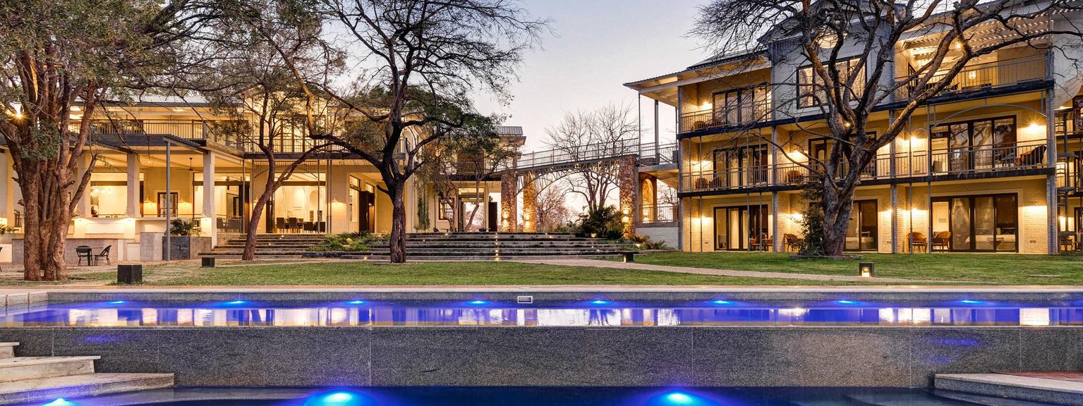 Palm River Hotel Pool and Exterior Night View