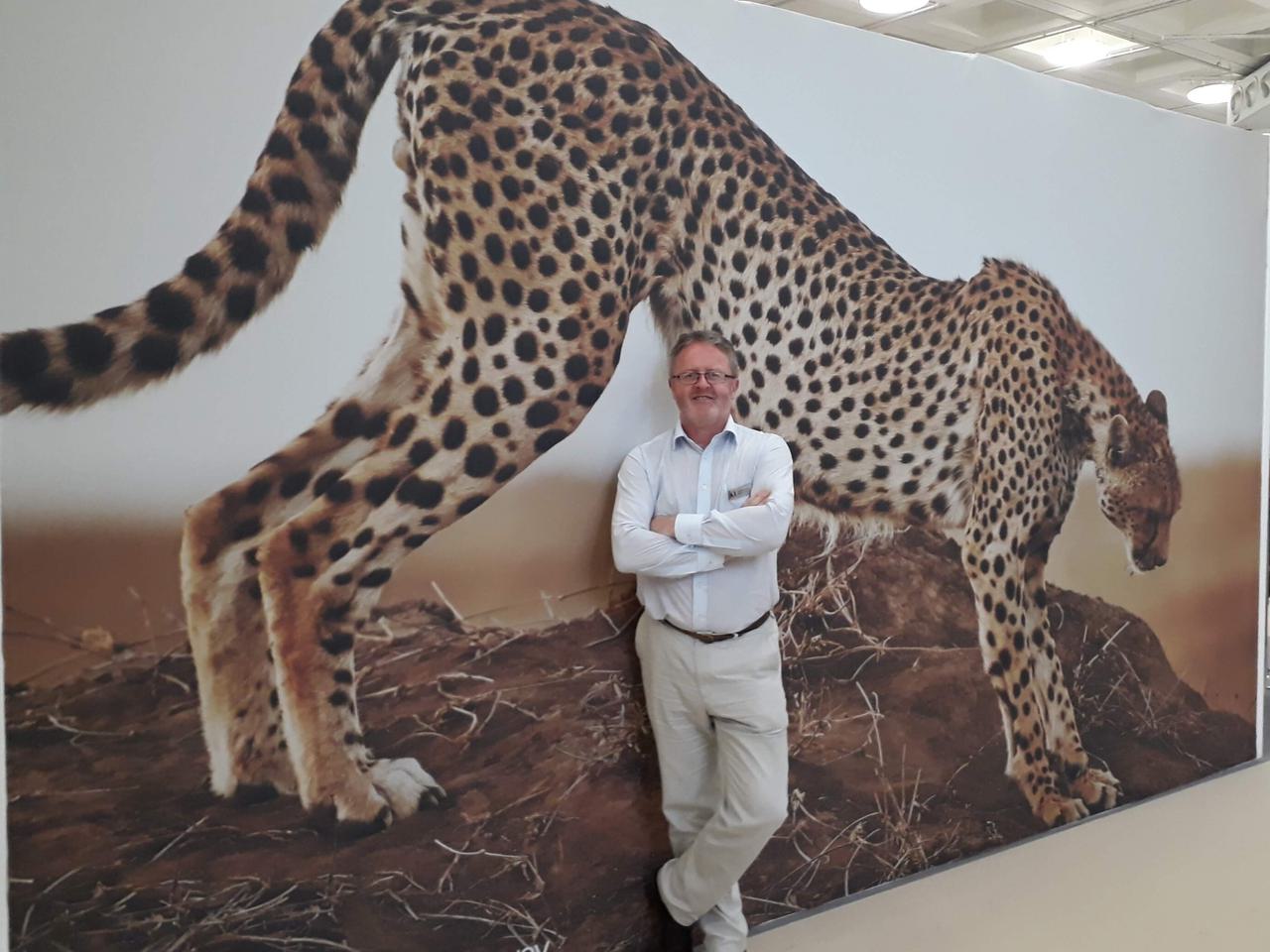 DH with leopard backdrop image