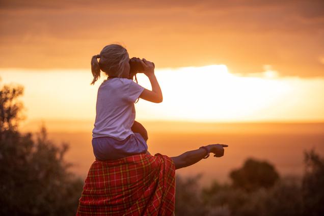 Child on Maasai Shoulders Binoculars House in Wild