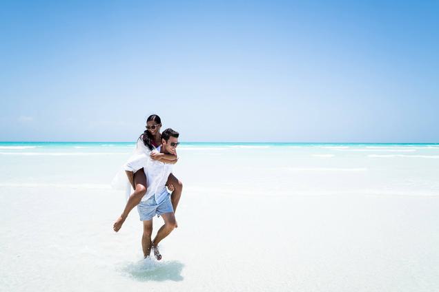 Beach Couple piggyback