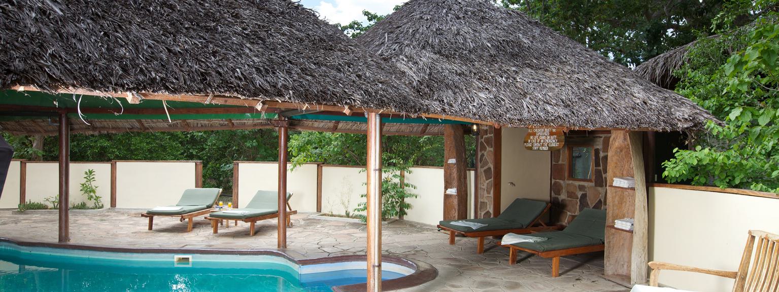 Rufiji River Camp Pool and Huts